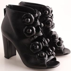 Chanel
Black Camellia Flower Lambskin Open Toe Heels Boots/Booties
Size: US 8